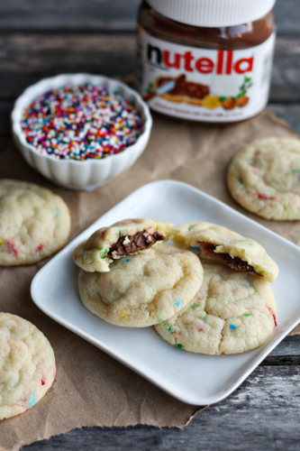 5 Ingredient Nutella Stuffed Funfetti Cookies by Not Your Momma's Cookie